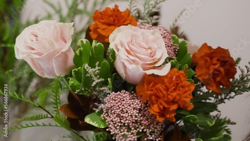 Close up look at various flowers in a V Day bouquet. photo