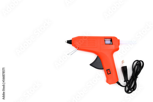 red glue gun close-up on a white background