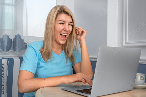 The girl uses the laptop