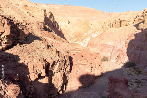 Fantastically beautiful landscape in the national nature reserve - Red Canyon in the rays of the setting sun  near the city of Eilat  in southern Israel