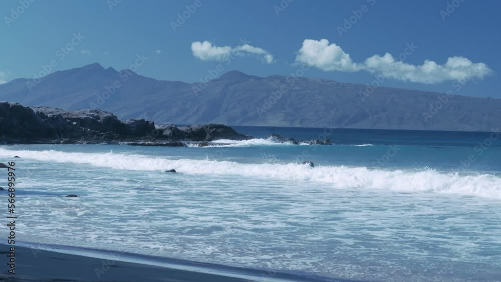 The waves break through this beautiful beach on the island of Maui Hawaii. The waves break through this beautiful beach on the island of Maui Hawaii.