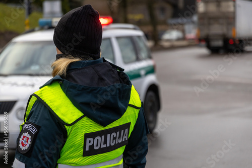 Police officer managing road traffic, Lithuania, Europe © Algimantas