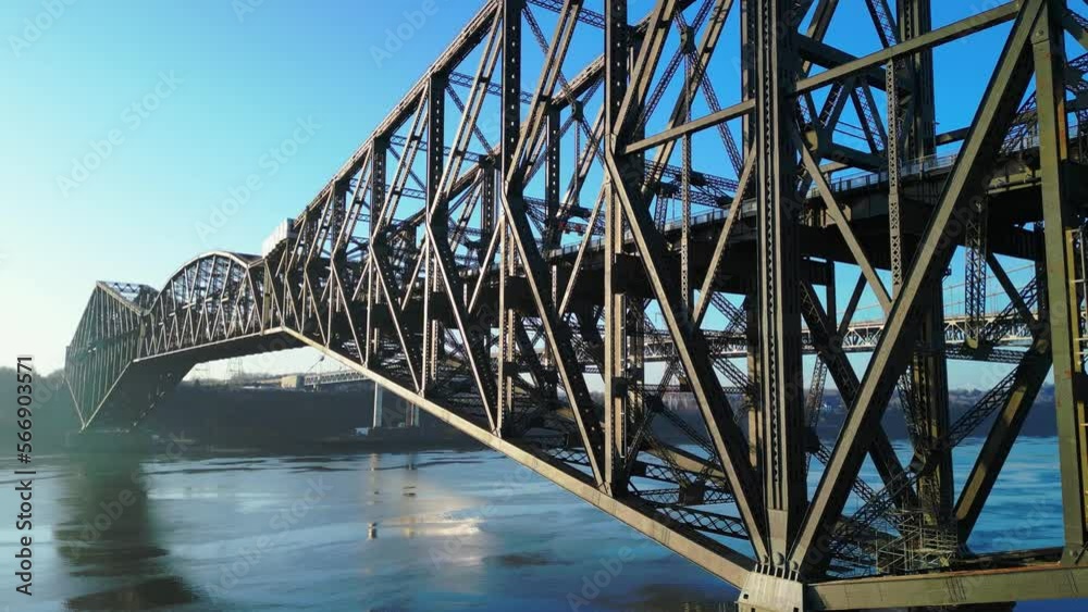 Drone Shot. View on the metal structure of a old bridge. Taking Elevation. Pan left