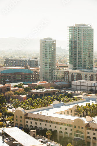 Afternoon sun shines on the urban skyline of downtown Tempe, Arizona, USA.