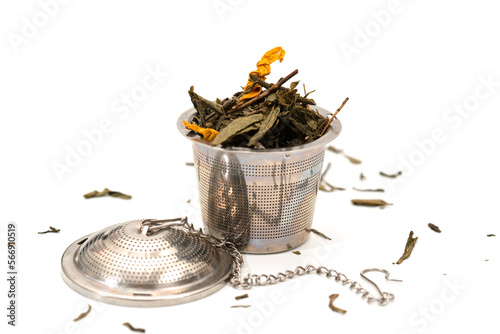 Tea infuser with green tea photo