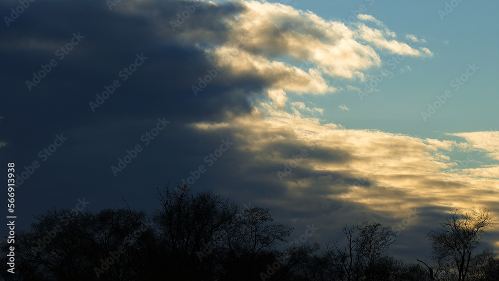 Heaven background. Clouds pattern. Sunlight. Contrasting light.