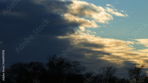 Heaven background. Clouds pattern. Sunlight. Contrasting light.