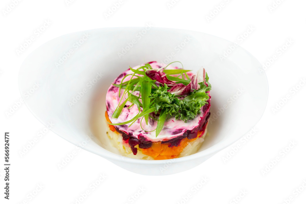 Herring under a fur coat in a white bowl, a traditional dish of Russian cuisine. Close-up. Isolated on white background. Herring under a fur coat in a white bowl, a traditional dish of Russian cuisine. Close-up. Isolated on white background.