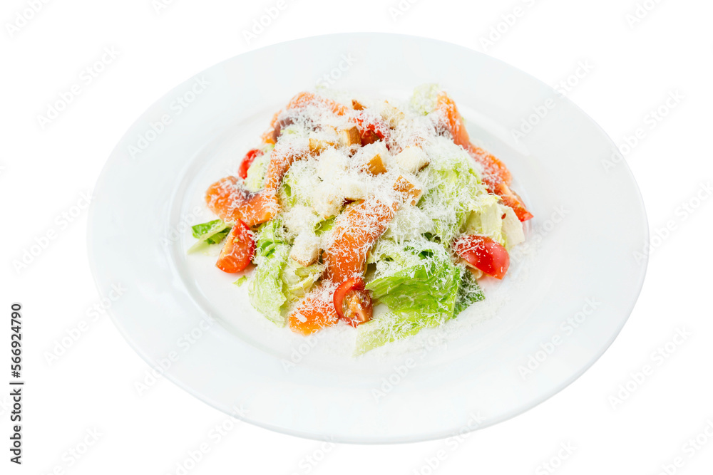 Caesar salad with red fish, tomatoes, lettuce and cheese. Appetizing popular snack. Close-up. Isolated on white background.