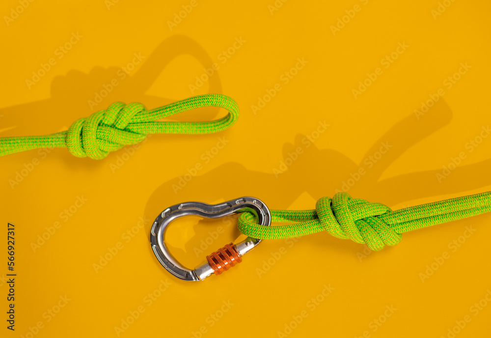 Steel carabiner with clutch. Equipment for climbing and mountaineering. Safety rope. Node eight. Steel carabiner with clutch. Equipment for climbing and mountaineering. Safety rope. Node eight.