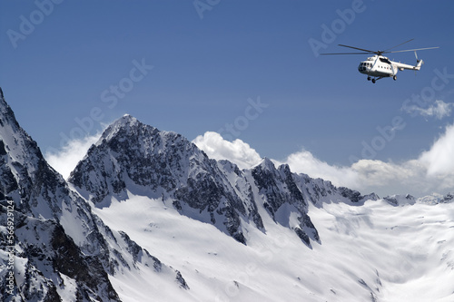 Helicopter in high mountains