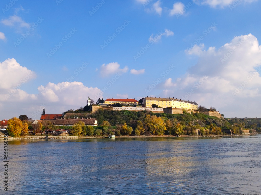 Petrovaradin fortress in colorful autumn colors by the river Danube