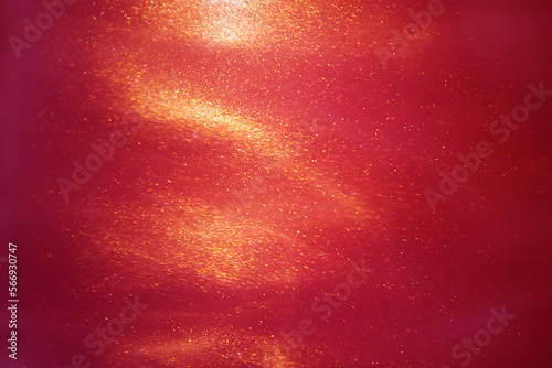 abstract red background with sparkles liquid waves and motion