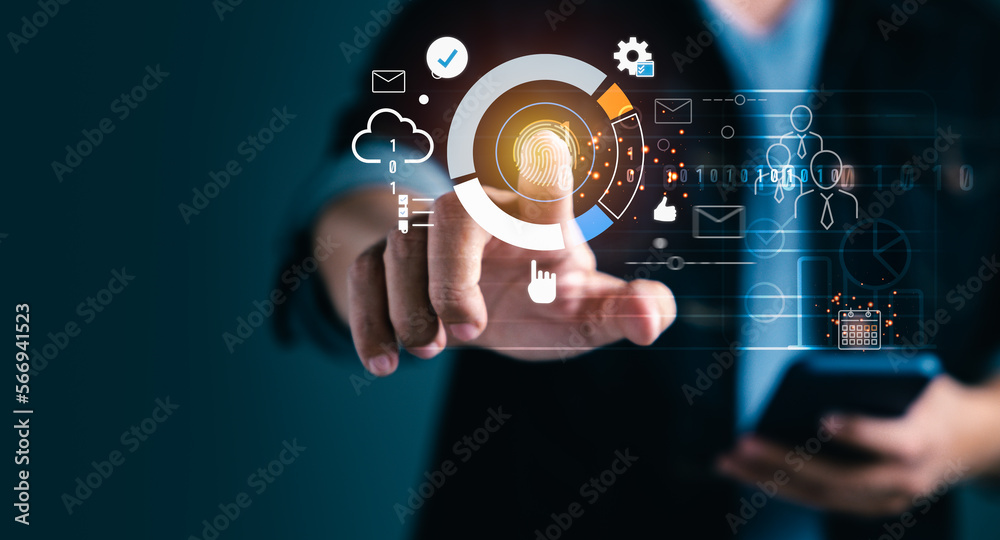 Businessman touching on virtual icons of sales strategy and analyzing
