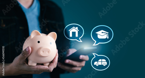 Man Hand holding a piggy bank with savings icons