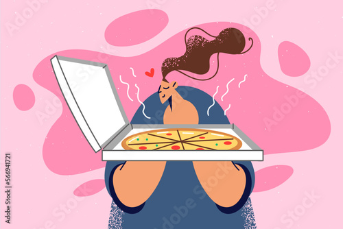 Happy woman smell tasty pizza in box