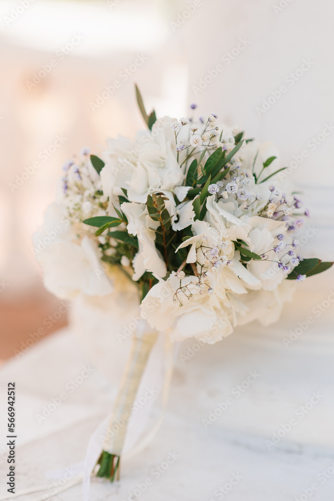 Beautiful bouquet of the bride in white with greenery Beautiful bouquet of the bride in white with greenery