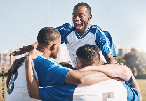 Soccer, celebration and men winning sports competition or game with teamwork on a field. Football champion group, friends or people happy and excited for goal, performance and fitness achievement