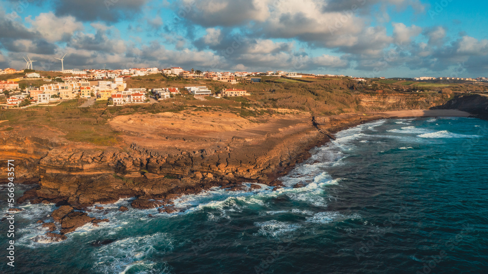 Beautiful coastline seascape in Europe.  Beautiful rocky seascape with rolling waves to the shore. Aerial view: beautiful nature landscape. Drone view of scenic nature  in Portugal.