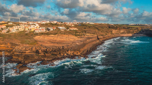 Beautiful coastline seascape in Europe.  Beautiful rocky seascape with rolling waves to the shore. Aerial view: beautiful nature landscape. Drone view of scenic nature  in Portugal.