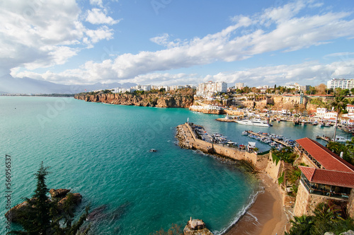 Landscape with sea marina and buildings on cliff. Antalya Turkey.