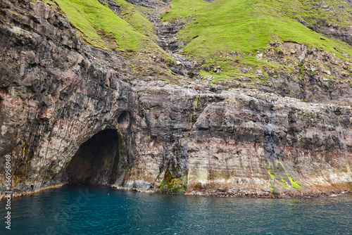 Faroe islands cliffs and caves in Vestmanna area. Streimoy, Denmark photo