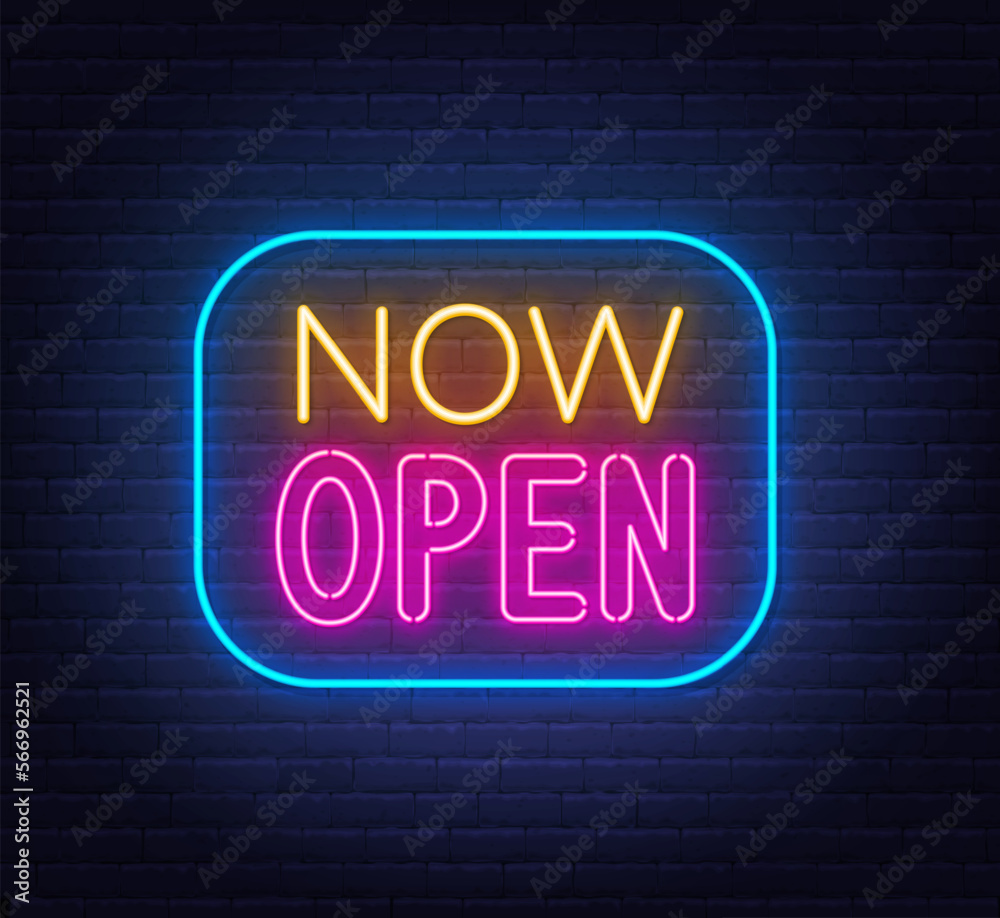 Now Open neon sign in frame on brick wall background.