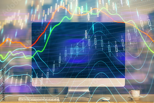 Financial market graph hologram and personal computer on background. Multi exposure. Concept of forex.