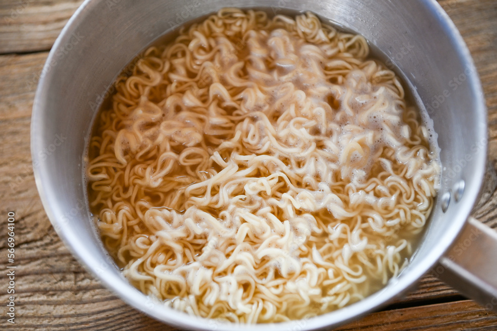 boiled instant noodles on hot pot - instant noodle cooked food boiled instant noodles on hot pot - instant noodle cooked food