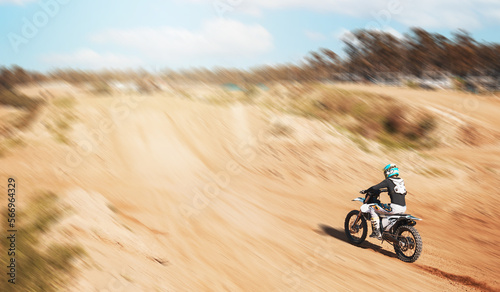 Sports  fitness and person with motorcycle  speed and action with power in desert  race or rally with athlete outdoor. Dirt bike  exercise and extreme sport mockup  freedom and adventure with travel