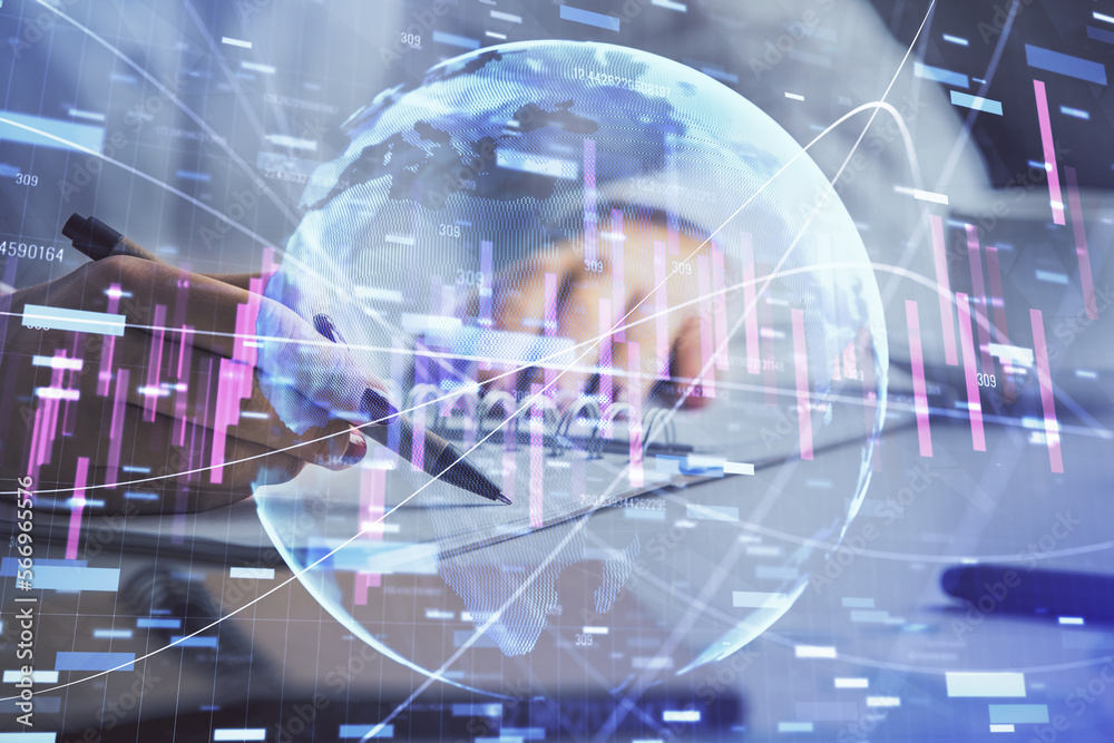 Double exposure of woman's hands making notes with forex graph hologram. Concept technical analysis. Double exposure of woman's hands making notes with forex graph hologram. Concept technical analysis.
