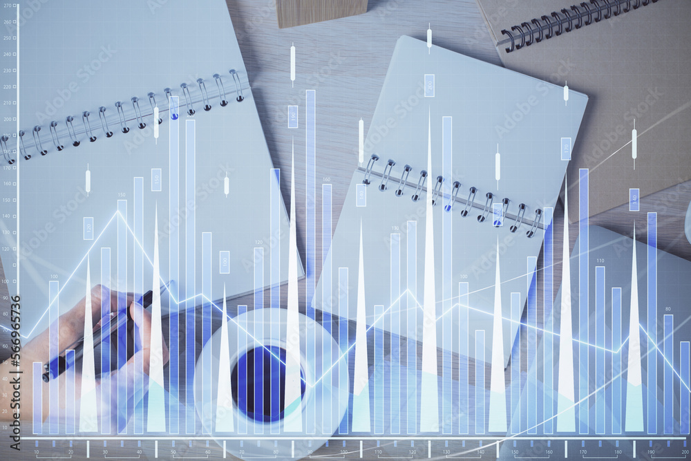 Multi exposure of woman's hands making notes with forex graph hologram. Concept of technical analysis. Multi exposure of woman's hands making notes with forex graph hologram. Concept of technical analysis.