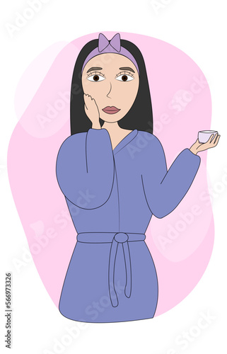 girl in bath robe making skin care