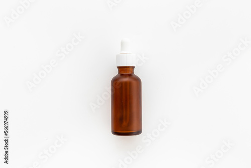 Cosmetic products concept - face serum essential oil in dropper bottle