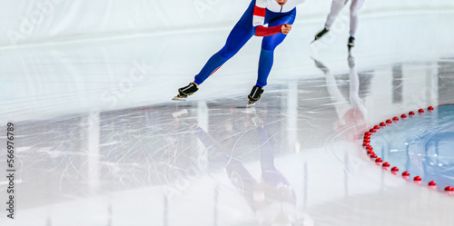 Obraz na plátně rivalry female athletes at speed skating competition