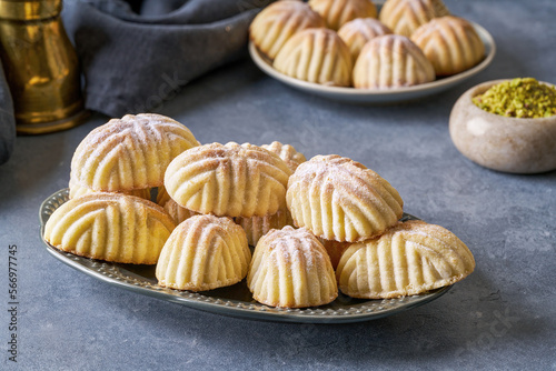 Semolina maamoul or mamoul cookies with dates , walnuts and pistachio nuts. Traditional arabic Eid al Adha, Eid al Fitr sweets