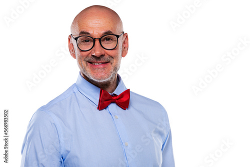 Studio shot of a middle aged man looking at camera while standing at isolated white background © gzorgz