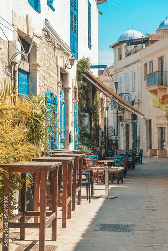 Streets of the old city of Limassol. Blue shutters on the colonial architecture of Cyprus.