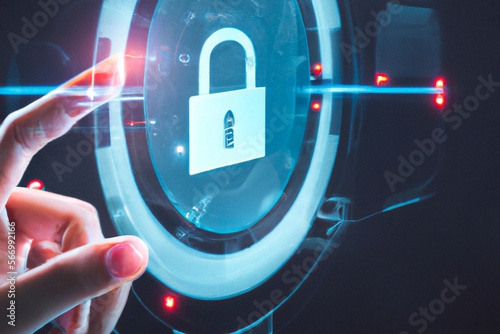 Cyber security and data protection on internet. Finger touching holographic secure access system interface with lock icon. Cybersecurity, privacy, network technology. Encrypted data.