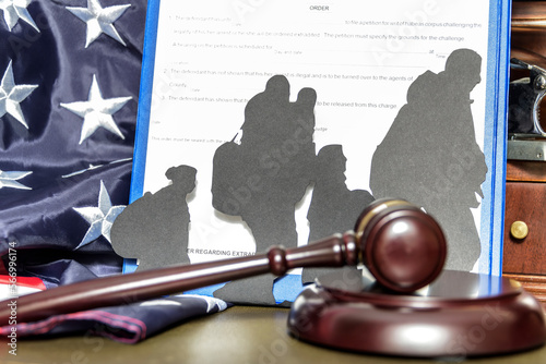 Immigration Removal Order. Silhouettes of people illegally crossing the border. photo