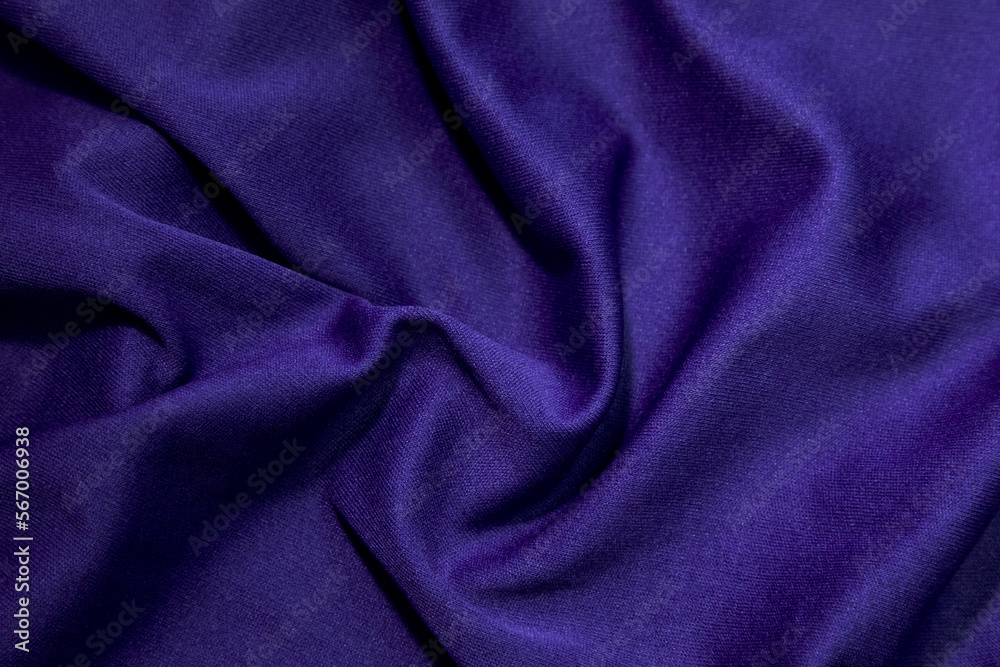 Fototapeta premium Blue fabric background. Blue cloth waves background texture. Blue fabric cloth textile material.