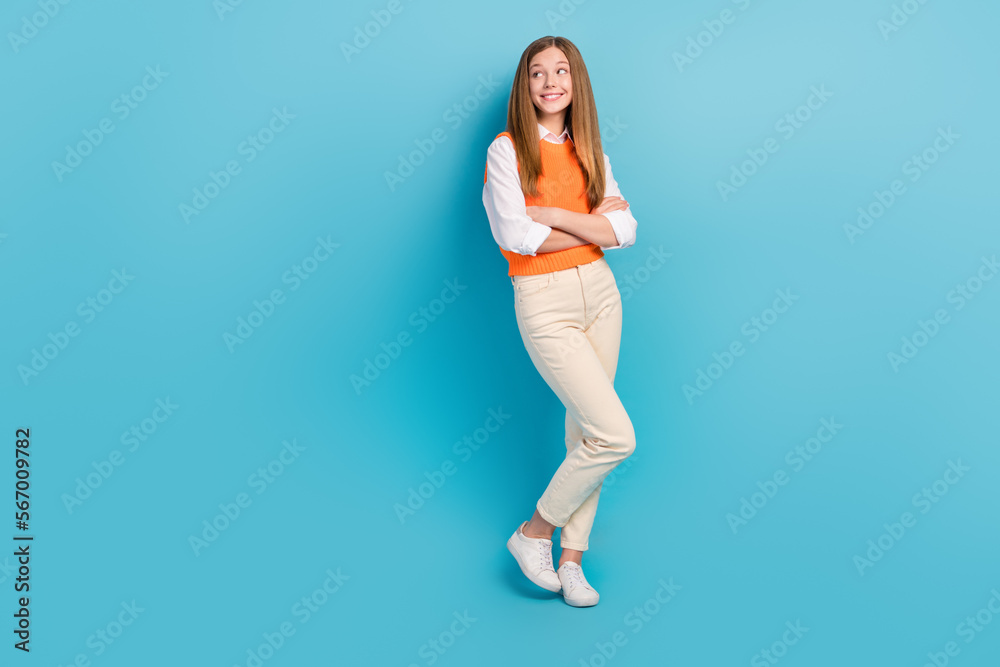 Full length photo of positive nice lady wear trendy look empty space news opening new shop isolated on blue color background