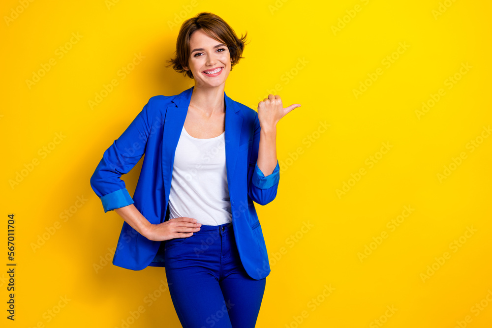 Photo of positive attractive cute business lady wear stylish trendy formal clothes blue outfit ukrainian person isolated on yellow color background Photo of positive attractive cute business lady wear stylish trendy formal clothes blue outfit ukrainian person isolated on yellow color background