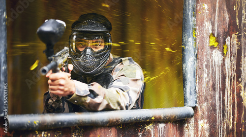 Quadro su tela Paintball, gun and soldier with a sports man playing a military game for fun or training outdoor