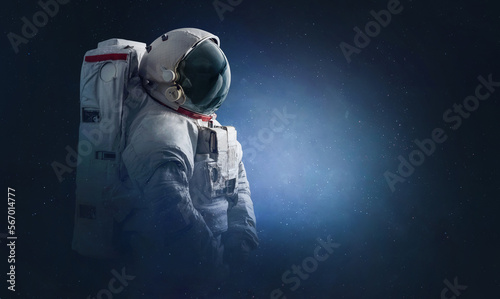 Astronaut in space. Spaceman in Universe with stars. Sci-fi surreal wallpaper. Deep space. Elements of this image furnished by NASA