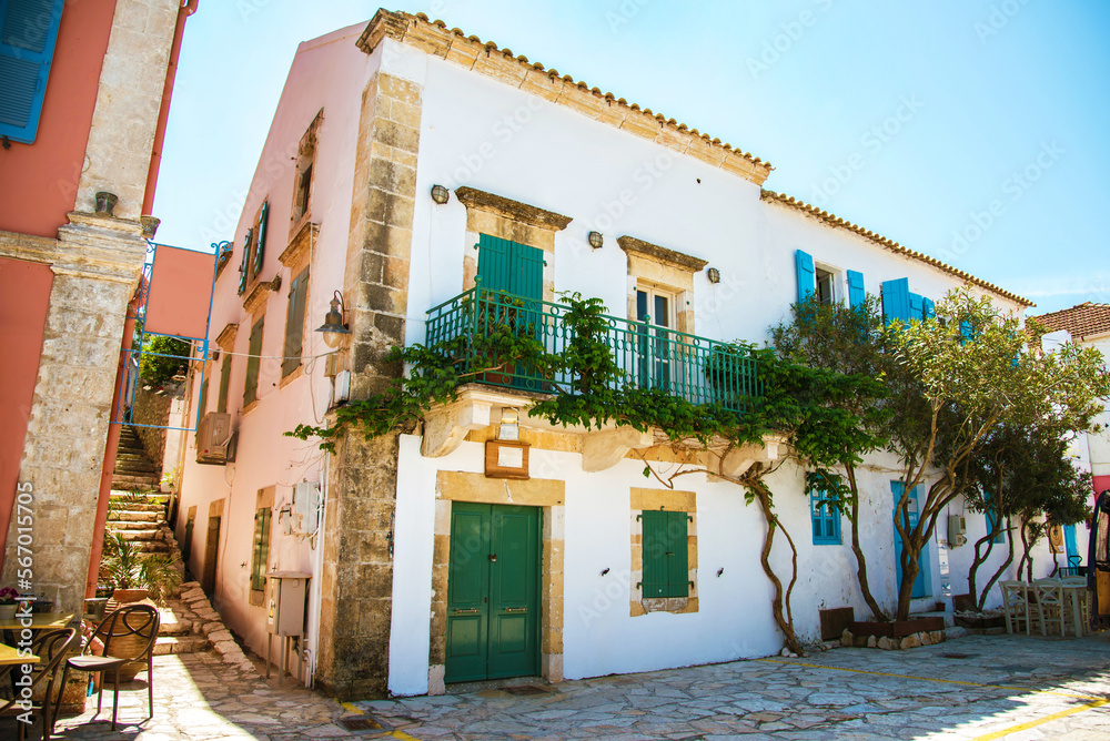 Beautiful atmospheric street view in the port town of Fiskardo, Kefalonia, Greece. Stunning amazing charming places. prominent tourist towns.