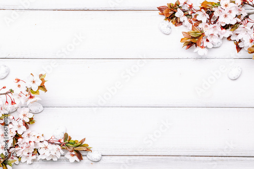 Easter eggs wood. April floral nature, white happy easter eggs on wood spring background. Easter pattern with place for text. 