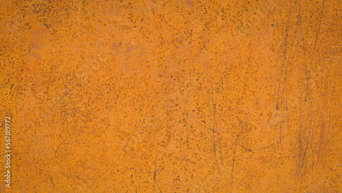 Old rusty plate on isolated orange background