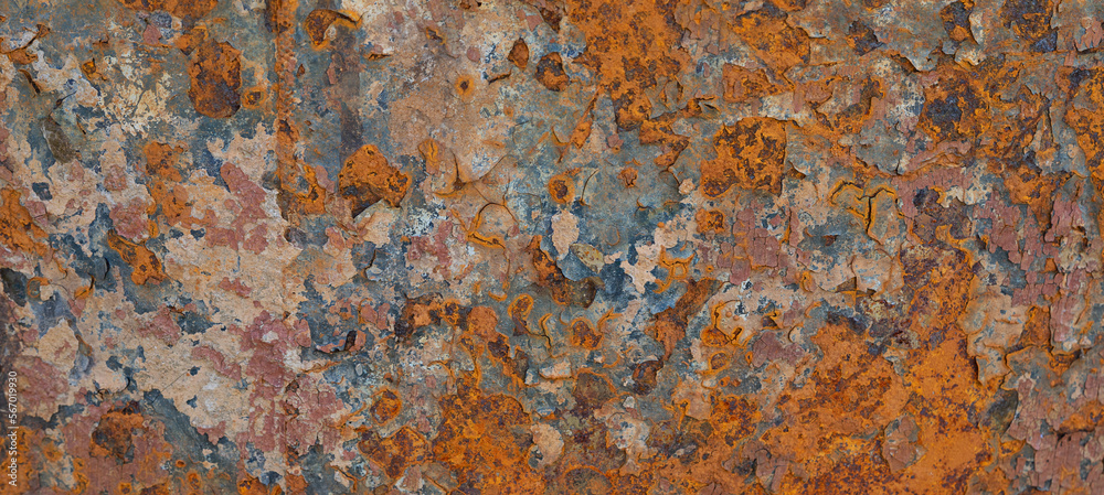 Old rusty plate on isolated orange background Old rusty plate on isolated orange background