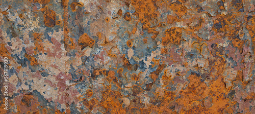 Old rusty plate on isolated orange background © Suprachai